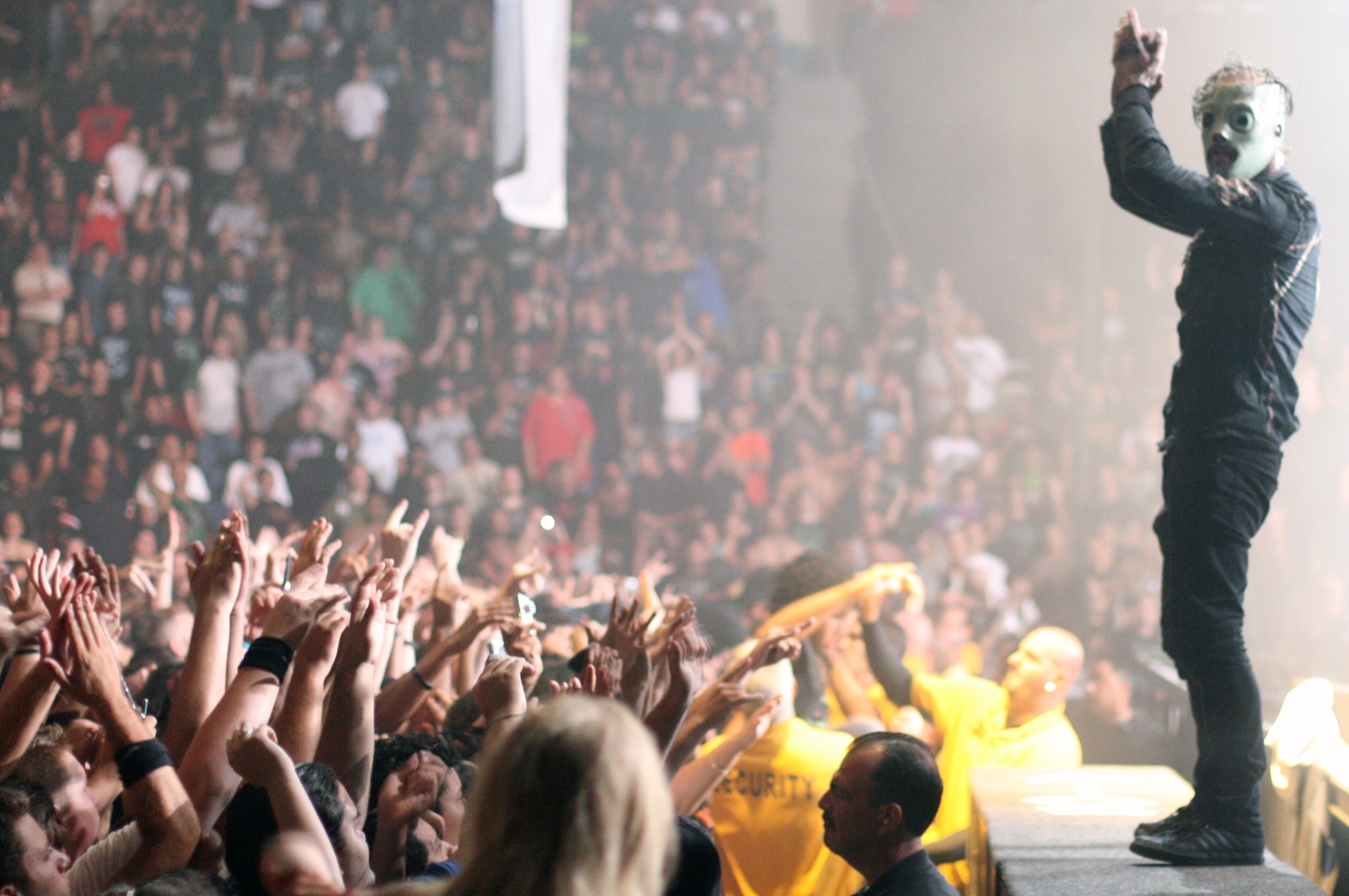 Slipknot performing live on stage, Corey Taylor at the mic